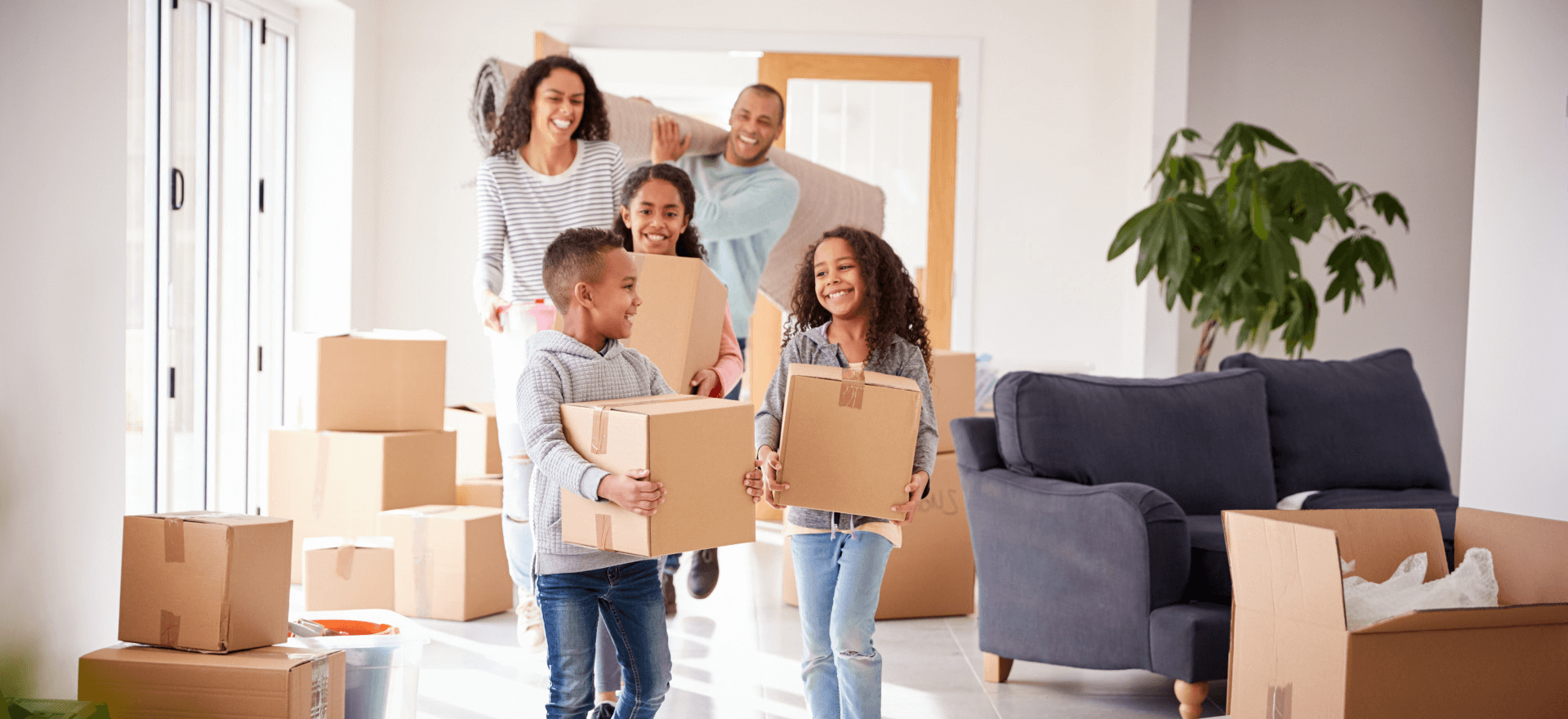 Happy family moving in to their new home thanks to Sgt Evans